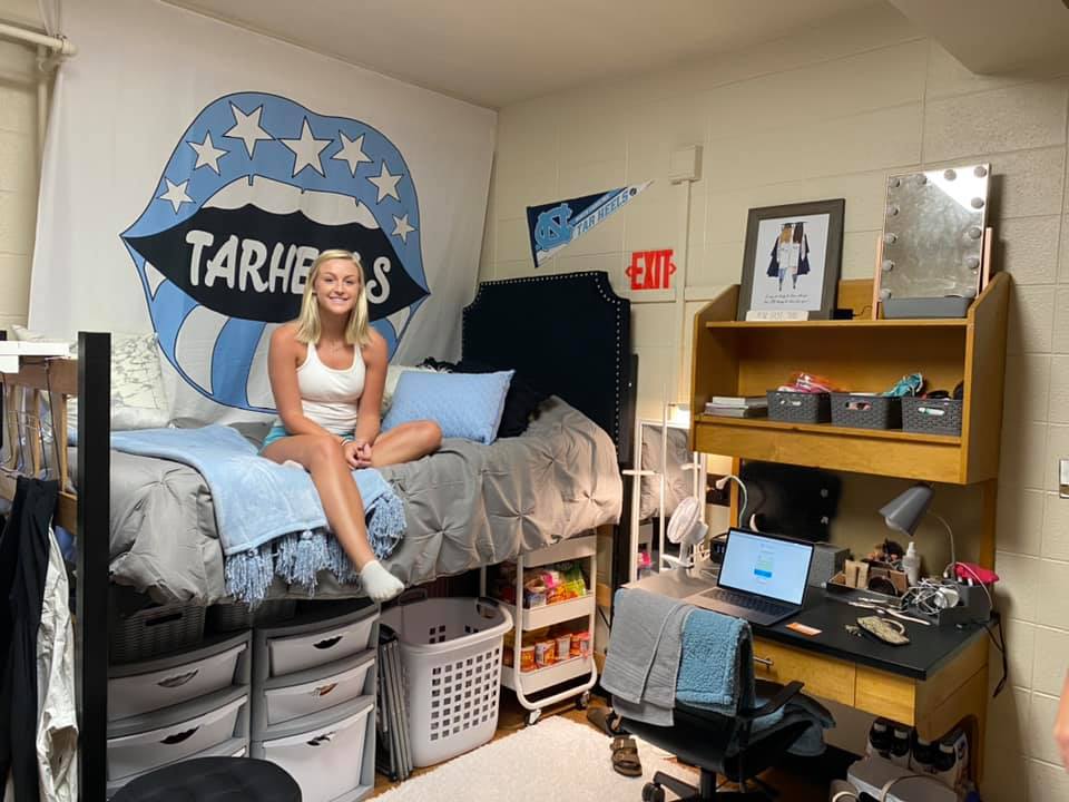 Student in her room on campus.