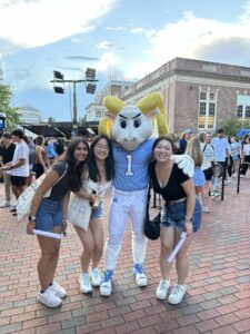 Students at UNC taking a photo with Rameses